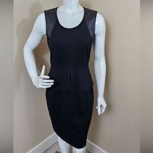 Calvin Klein peplum dress with faux leather detail. Worn once.